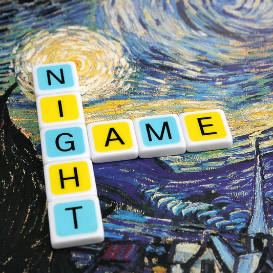 Bring back family game night. Turn off the screens and rediscover why some of our best moments happen when we’re all gathered around a table. ‘game night’ crossword made with colorful letter tiles on a Van Gogh painting background